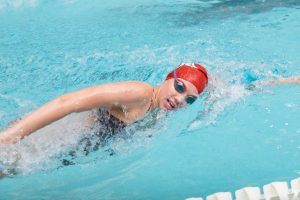 Swim Sets Four Records, Schultz Takes Second
